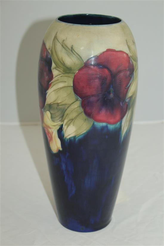 Two William Moorcroft pansy pattern vases, c.1917, 27cm, latter vase repaired